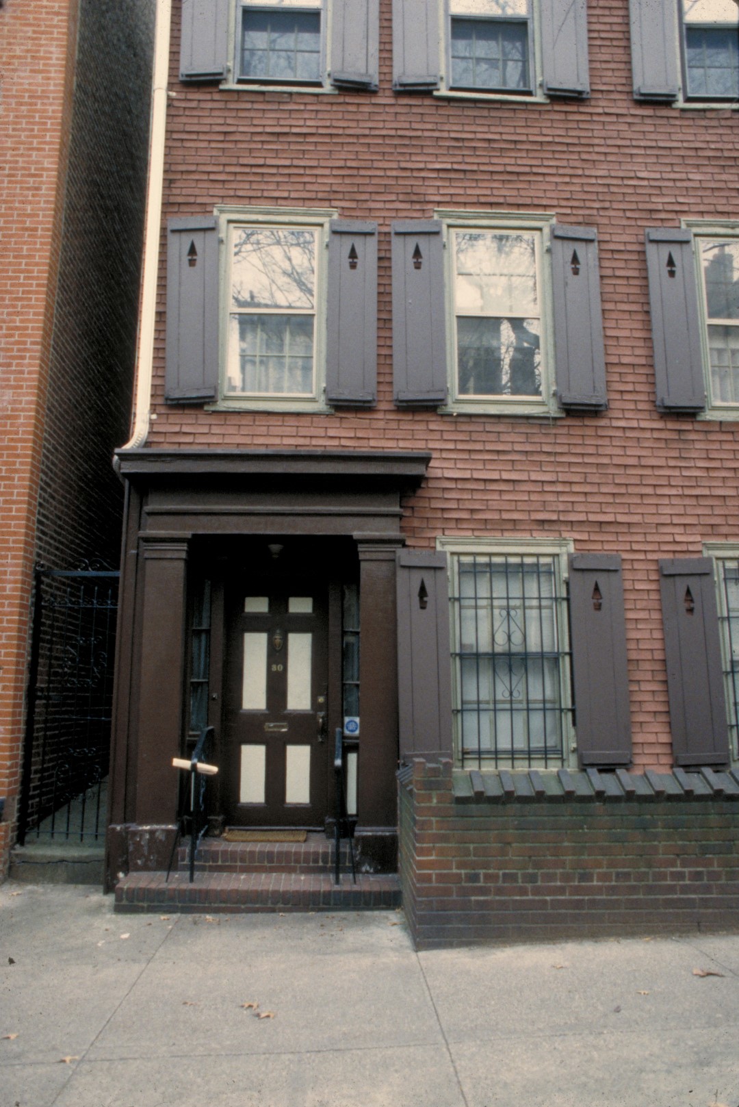 Historic photo of the front facade before renovation