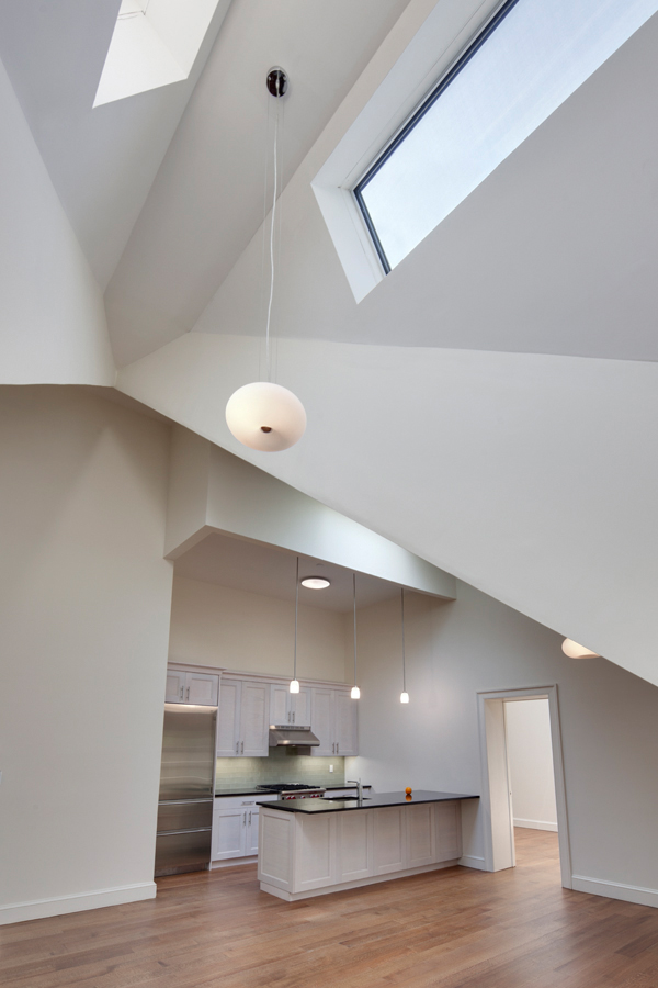 Kitchen with two skylights and very high ceilings in a Brooklyn condo